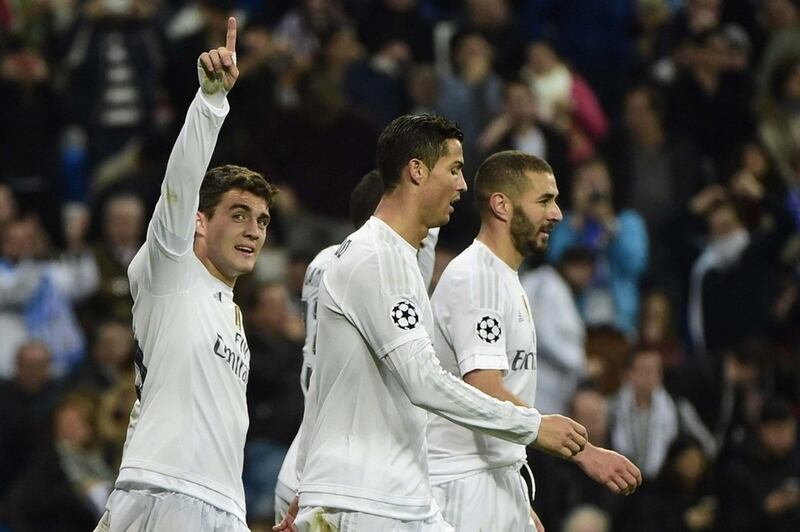 Real Madrid midfielder Mateo Kovacic, left, shown celebrating after scoring against Malmo in the Champions League in December. Pierre-Philippe Marcou / AFP