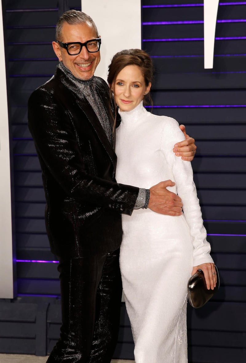 Jeff Goldblum in Givenchy and Emilie Livingston arrive at the 2019 Vanity Fair Oscar Party. Reuters