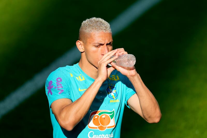 Brazil's Richarlison drinks water during a training session at Seoul World Cup stadium in Seoul, South Korea. AP Photo