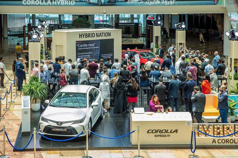 A private audience gathers in Dubai Festival City Mall for the grand unveiling of the 2019 Corolla.