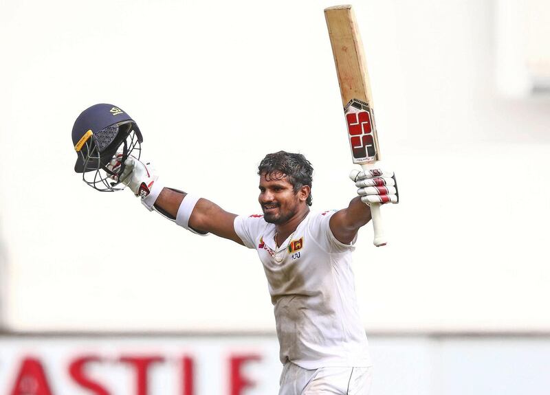 Sri Lanka's Kusal Perera celebrates the victory after hittting the winning runs during the fourth day of the first Cricket Test between South Africa and Sri Lanka at the Kingsmead Stadium in Durban on February 16, 2019. / AFP / Anesh DEBIKY

