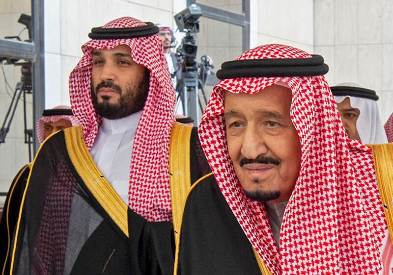 A handout picture provided by the Saudi Royal Palace on November 20, 2019 shows Saudi Arabia's King Salman bin Abdulaziz (R) arriving with Crown Prince Mohammed bin Salman to address the Shura council, a top advisory body, in the capital Riyadh. Saudi Arabia's King Salman urged arch-rival Iran to abandon an expansionist ideology that has "harmed" its own people, following violent street protests in the Islamic republic. - RESTRICTED TO EDITORIAL USE - MANDATORY CREDIT "AFP PHOTO / SAUDI ROYAL PALACE / BANDAR AL-JALOUD" - NO MARKETING - NO ADVERTISING CAMPAIGNS - DISTRIBUTED AS A SERVICE TO CLIENTS
 / AFP / Saudi Royal Palace / Bandar AL-JALOUD / RESTRICTED TO EDITORIAL USE - MANDATORY CREDIT "AFP PHOTO / SAUDI ROYAL PALACE / BANDAR AL-JALOUD" - NO MARKETING - NO ADVERTISING CAMPAIGNS - DISTRIBUTED AS A SERVICE TO CLIENTS
