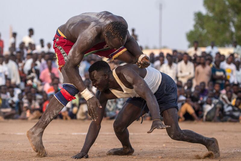 Wrestlers compete during a traditional Nuba wrestling competition in Sudan's capital Khartoum.