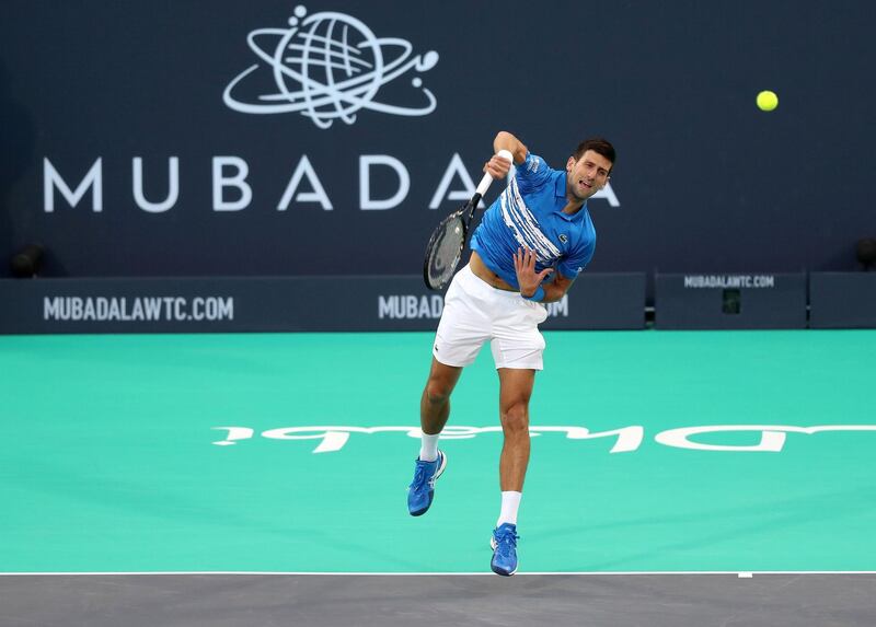 Abu Dhabi, United Arab Emirates - Reporter: Jon Turner: Novak Djokovic serves during the semi final between Novak Djokovic v Stefanos Tsitsipas at the Mubadala World Tennis Championship. Friday, December 20th, 2019. Zayed Sports City, Abu Dhabi. Chris Whiteoak / The National