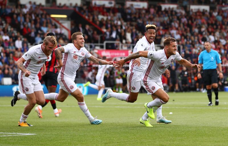 BOURNEMOUTH, ENGLAND - AUGUST 10: Billy Sharp of Sheffield United celebrates after scoring his team's first goal during the Premier League match between AFC Bournemouth and Sheffield United at Vitality Stadium on August 10, 2019 in Bournemouth, United Kingdom. (Photo by Michael Steele/Getty Images)