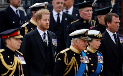 Prince Harry, centre, arrives at Westminster Abbey for the funeral of Queen Elizabeth II, along with (in front, from left) King Charles III; Anne, Princess Royal and her son Peter Phillips. AP Photo