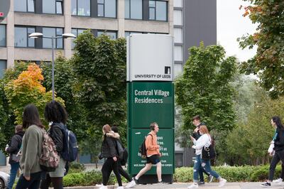 Students walk through University of Leeds Central Village residencies.
