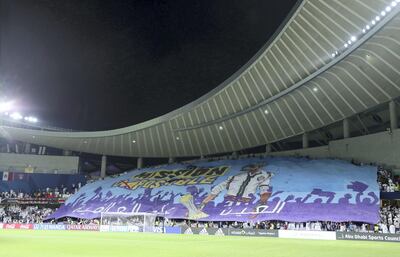 Al Ain, United Arab Emirates - December 18, 2018: Fans with a banner before the game between River Plate and Al Ain in the Fifa Club World Cup. Tuesday the 18th of December 2018 at the Hazza Bin Zayed Stadium, Al Ain. Chris Whiteoak / The National