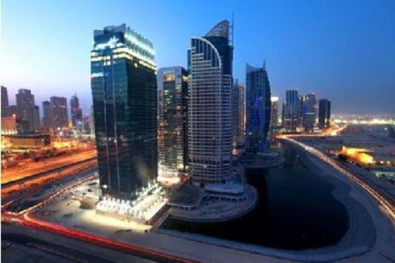 High rise buildings complete the scenery of Jumeirah Lake Towers in Dubai.