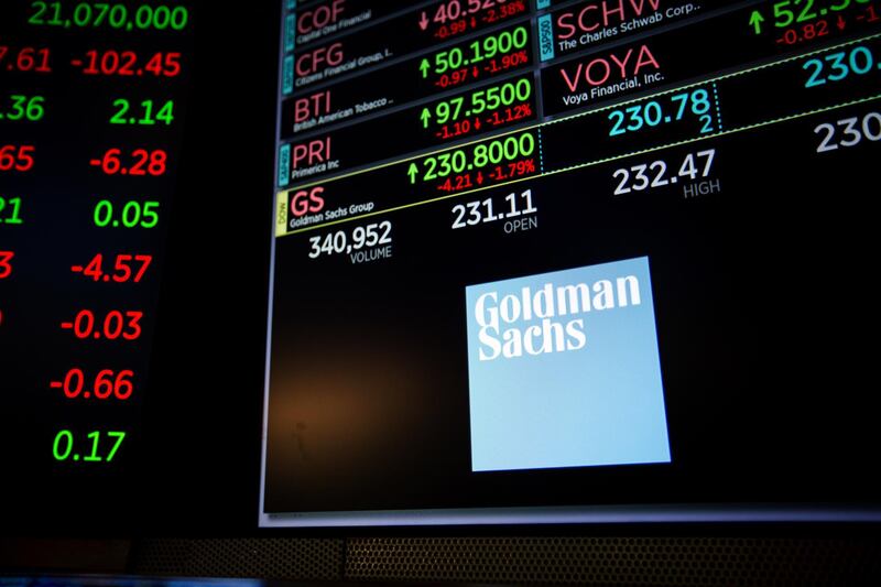 A monitor displays Goldman Sachs Group Inc. signage on the floor of the New York Stock Exchange (NYSE) in New York, U.S., on Tuesday, May 29, 2018. Stocks declined, while Treasuries and the dollar rallied as the escalating political crisis in Italy engulfed markets. Photographer: Michael Nagle/Bloomberg