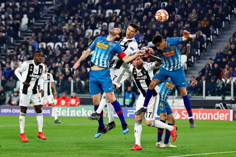 TURIN, ITALY - MARCH 12:  Cristiano Ronaldo of Juventus scores his side's second goal during the UEFA Champions League Round of 16 Second Leg match between Juventus and Club de Atletico Madrid at Allianz Stadium on March 12, 2019 in Turin, Italy. (Photo by Chris Brunskill/Fantasista/Getty Images)