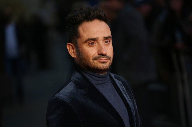 Director J A Bayona poses for photographers upon arrival at the premiere of the film A Monster Calls during the London Film Festival. Joel Ryan / Invision / AP