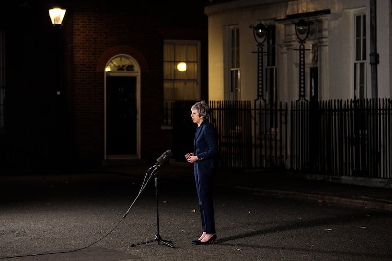 Ms May makes a statement outside Number 10 Downing Street in December 2018 after surviving a confidence ballot in her leadership