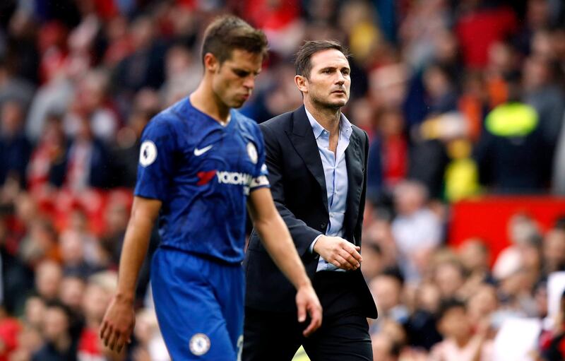 Lampard walks down the touchline post-match. PA