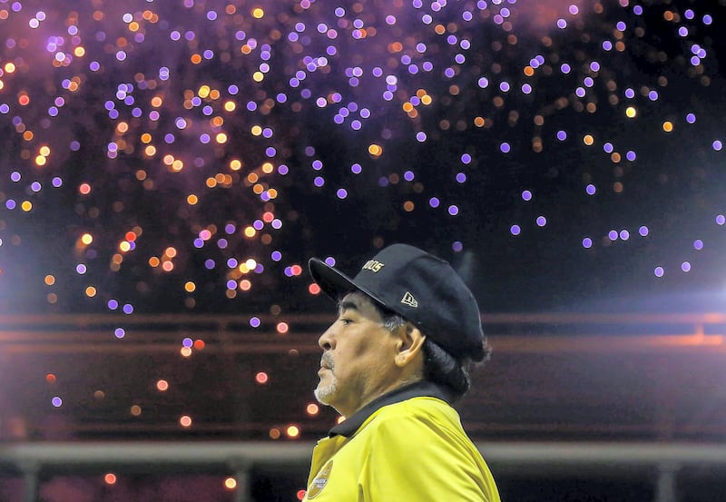 (FILES) In this file picture taken on November 29, 2018 Mexican second division football club Dorados' Argentine coach Diego Armando Maradona looks on before a match of the first round of the Final against Atletico San Luis at the Banorte stadium in Culiacan, Sinaloa State, Mexico. Argentine football legend Diego Maradona turns 60 on October 30, 2020.   / AFP / RASHIDE FRIAS
