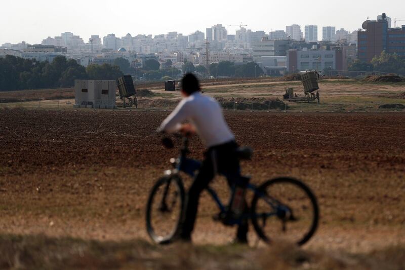 A person looks at Iron dome missile system near the city of Ashdod, south of Israel.  EPA