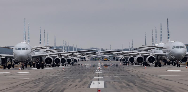 PITTSBURGH, PA - MARCH 27: Jets are parked on runway 28 at the Pittsburgh International Airport on March 27, 2020 in Pittsburgh, Pennsylvania. Due to decreased flights as a result of the coronavirus (COVID-19) pandemic, close to 70 American Airlines planes are being stacked and parked at the airport.   Jeff Swensen/Getty Images/AFP
== FOR NEWSPAPERS, INTERNET, TELCOS & TELEVISION USE ONLY ==
