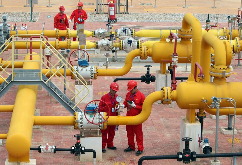 Mandatory Credit: Photo by Shutterstock (9119544a)
Chinese technicians of PetroChina Kunlun Gas Co., Ltd. check valves and pipes at a natural gas transmission station of the Sino-Myanmar pipelines in Kunming city, Yunnan.
PetroChina workers, China - 10 Jun 2015
PetroChina is discussing selling a stake in domestic gas pipelines worth an estimated $47 billion in total, sources said, in a move seen as a prelude to Beijing's plans to break the state giant's near monopoly and boost spending on energy infrastructure. The sale could attract domestic interest from Chinese institutions, asset managers and private equity investors, sources familiar with the matter said. PetroChina produces two-thirds of China's natural gas and controls nearly 80 percent of the country's patchy 90,000-kilometer gas pipelines, a bottlenecked grid that has prevented greater use of a fuel with half the greenhouse gas emissions of China's biggest energy source, coal.