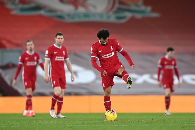 LIVERPOOL, ENGLAND - FEBRUARY 07: Mohamed Salah of Liverpool looks dejected after Manchester City's third goal scored by Raheem Sterling (Not pictured) during the Premier League match between Liverpool and Manchester City at Anfield on February 07, 2021 in Liverpool, England. Sporting stadiums around the UK remain under strict restrictions due to the Coronavirus Pandemic as Government social distancing laws prohibit fans inside venues resulting in games being played behind closed doors. (Photo by Laurence Griffiths/Getty Images)