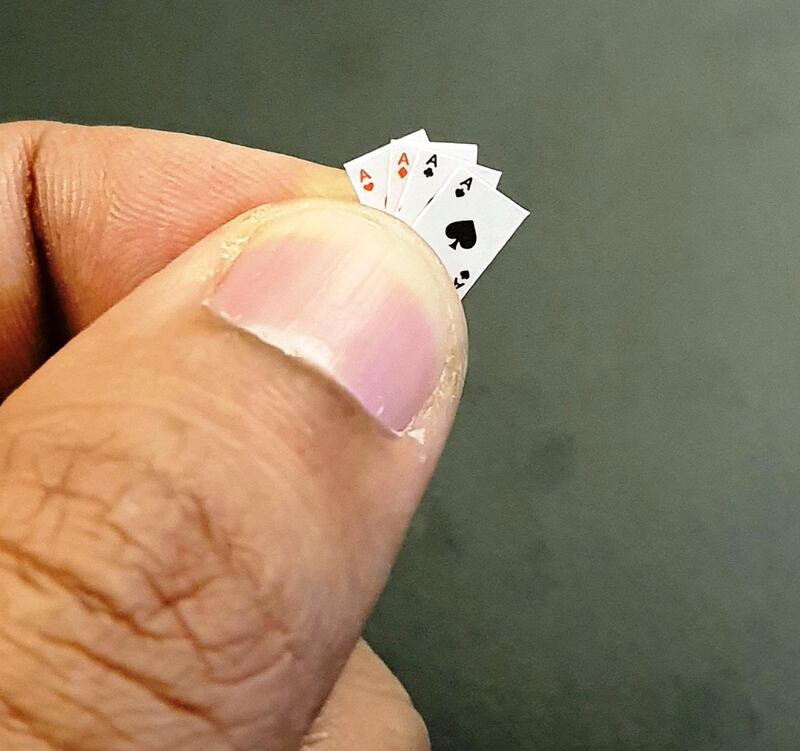 World's smallest pack of playing cards, which are 161 times smaller than regular playing cards. Photo courtesy: Ramkumar Sarangapani