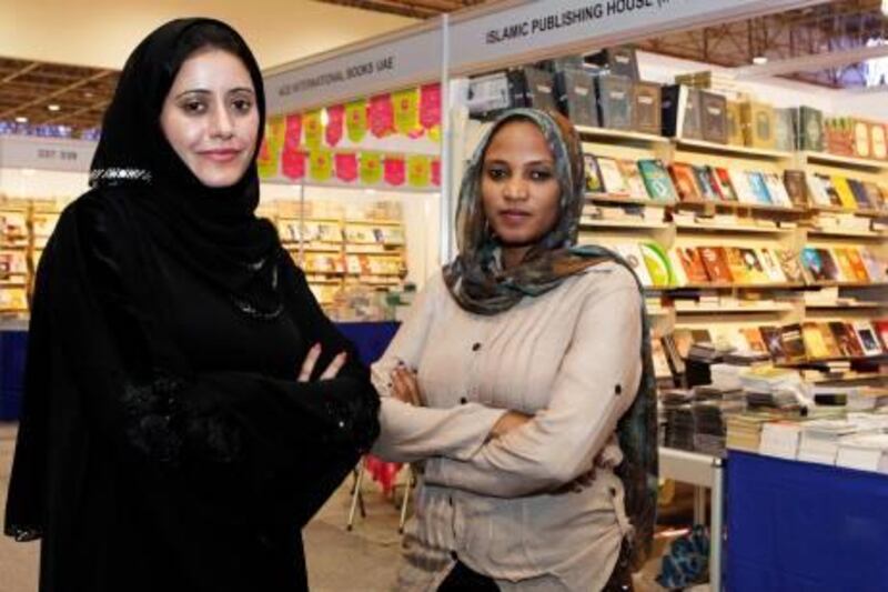 Sharjah, 27th October 2010.  (Left to right)  Mariam Al Saedi (Emarati) and Rania Mamoum (of Sudan) both fiction writers during the Sharjah Book Fair in Sharjah Expo Centre.  (Jeffrey E Biteng / The National)