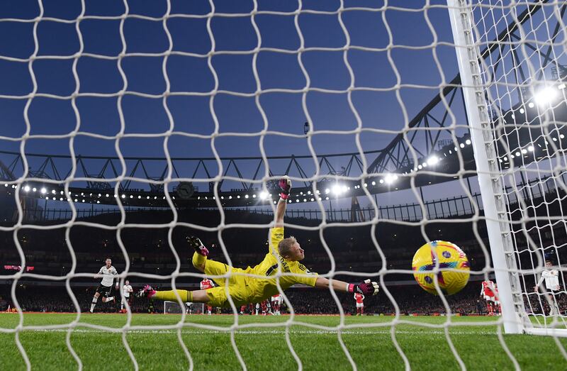 United's Marcus Rashford of Manchester United scores past Arsenal goalkeeper Aaron Ramsdale. Getty