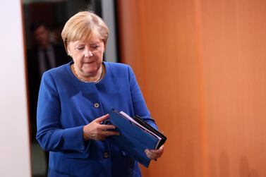 Angela Merkel arrives to discuss the federal budget with her cabinet. Getty