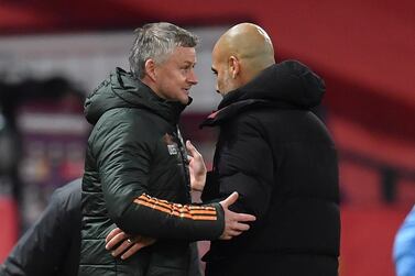 Manchester United's Ole Gunnar Solskjaer chats with City manager Pep Guardiola after the Old Trafford stalemate. EPA