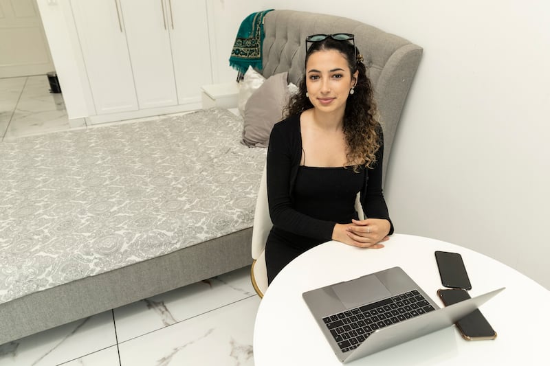 Mouna Ramdani, 24, is delighted to have a home to call her own after swapping a shared flat in Dubai Marina for a studio in Arjan. All pictures by Antonie Robertson / The National
