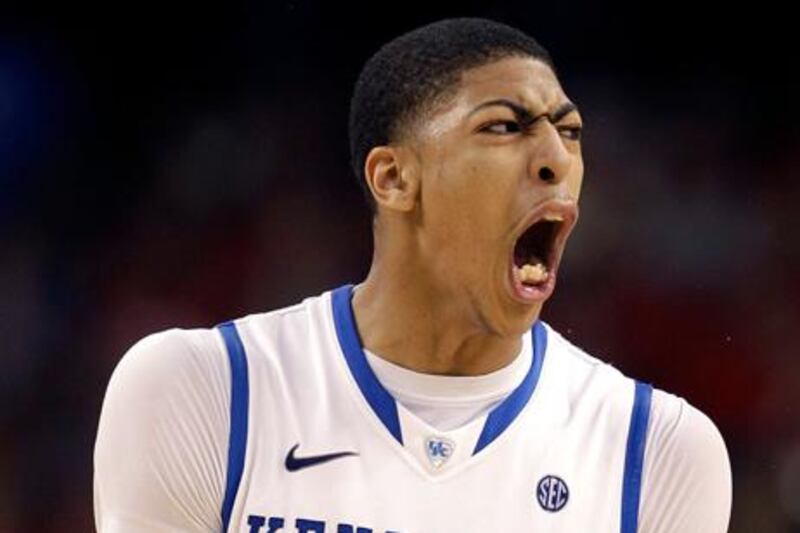 FILE - In this March 31, 2012 file photo, Kentucky forward Anthony Davis (23) reacts during the second half of an NCAA Final Four semifinal college basketball tournament game against Louisville, in New Orleans. Davis is a possible pick in the NBA Draft on Jan. 28.  (AP Photo/David J. Phillip, File)