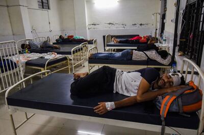 Some of the 71 passengers injured in the derailment near Raghunathpur in Bihar state recover at a government hospital. AP