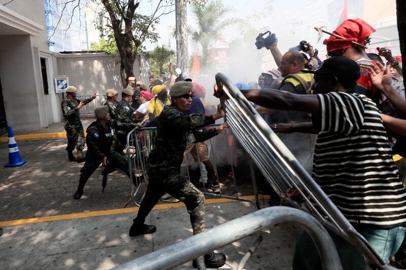 Afro-descendants known as Garifunas confront the military during a demonstration in Tegucigalpa, Honduras, to demand compliance with three international rulings in favor of three Garifuna communities. EPA