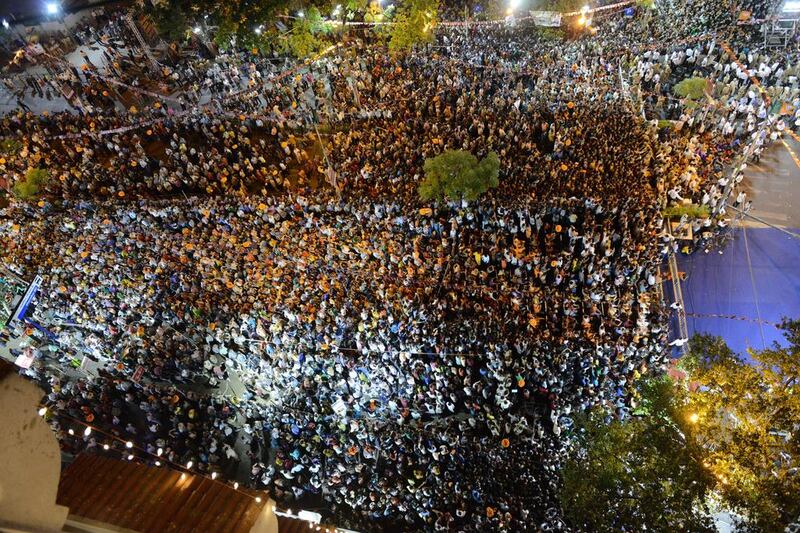 Indian Bharatiya Janata Party (BJP) supporters in large numbers attend a rally by Chief Minister of western Gujarat state and BJP prime ministerial candidate Narendra Modi in Ahmedabad.  Sam Panthaky / AFP Photo