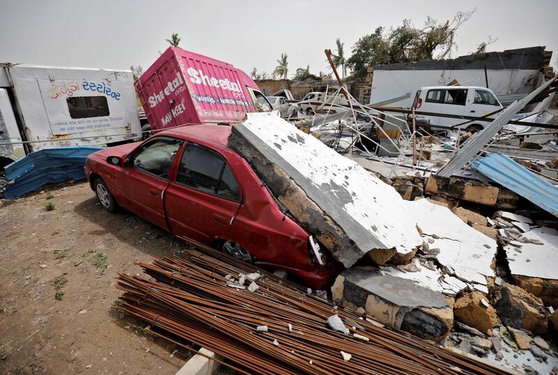 A vehicle crushed by falling masonry after Cyclone Tauktae  hit Una in the western state of Gujarat, India. Reuters