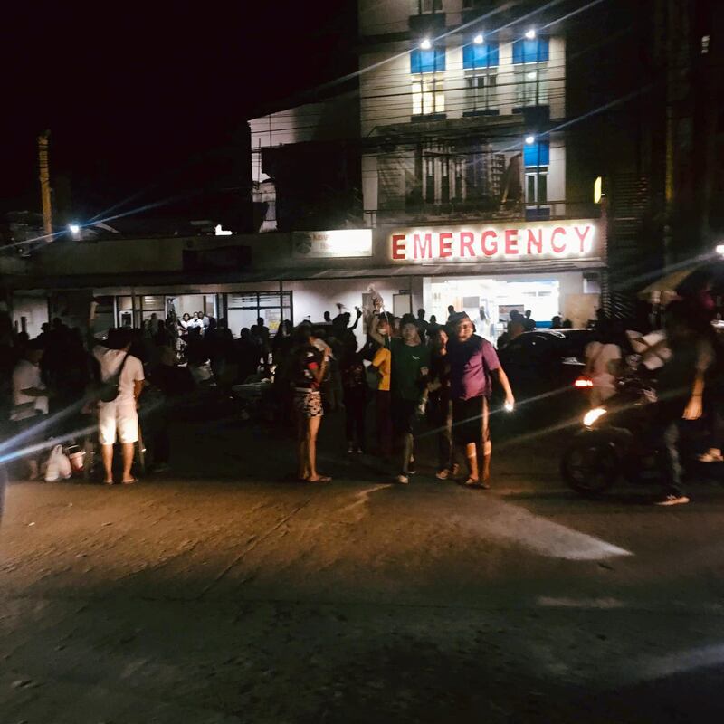 People are seen receiving assistance outside Kidapawan Doctors Hospital in Kidapawan City, after an earthquake, in Kidapawan City, Philippines October 16, 2019 in this picture obtained from social media. Sraprap Rafael/via REUTERS THIS IMAGE HAS BEEN SUPPLIED BY A THIRD PARTY. MANDATORY CREDIT. NO RESALES. NO ARCHIVES.