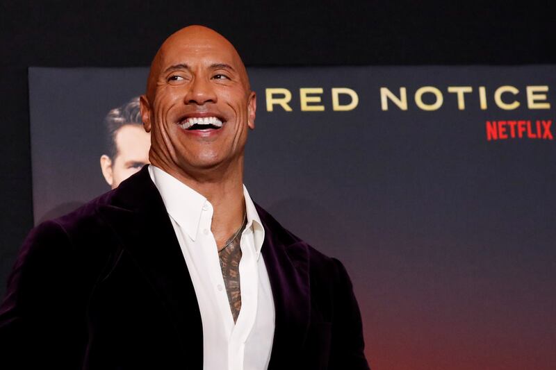 Wrestler-turned-actor Dwayne Johnson will turn 50 in 2022. He is seen here at the premiere of 'Red Notice' on November 3, 2021. Reuters