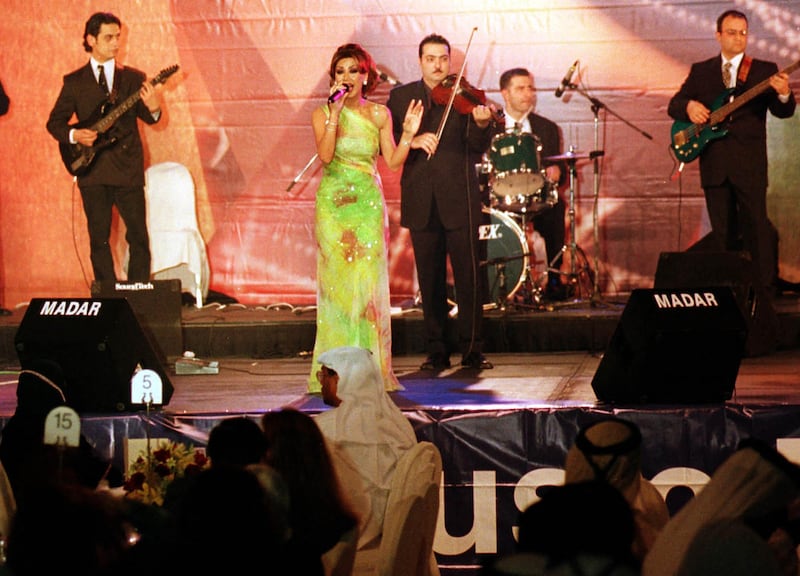 Lebanese pop singer Nawal al-Zoghbi in Dubai on March 1, 2001, the first day of the Dubai Shopping Festival. Zoghbi was one of many Arab singers to perform in Dubai during the month-long shopping bonanza. AFP