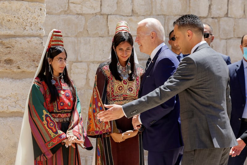 US President Joe Biden is introduced to local people at the Church of Nativity in Bethlehem. Reuters