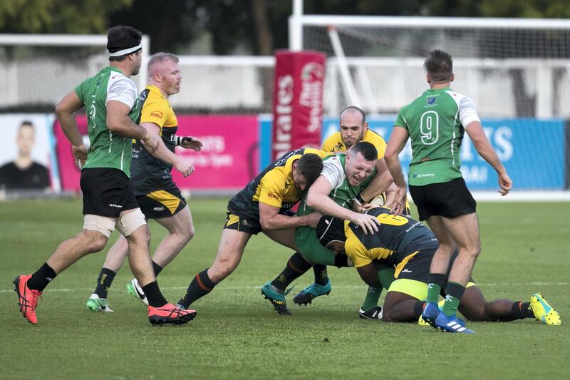 DUBAI, UNITED ARAB EMIRATES - NOVEMBER 2, 2018. 

Dubai Hurricanes, yellow, play against Dubai Sports City Eagles, green, in West Asia Premiership match.

(Photo by Reem Mohammed/The National)

Reporter:
Section:  SP