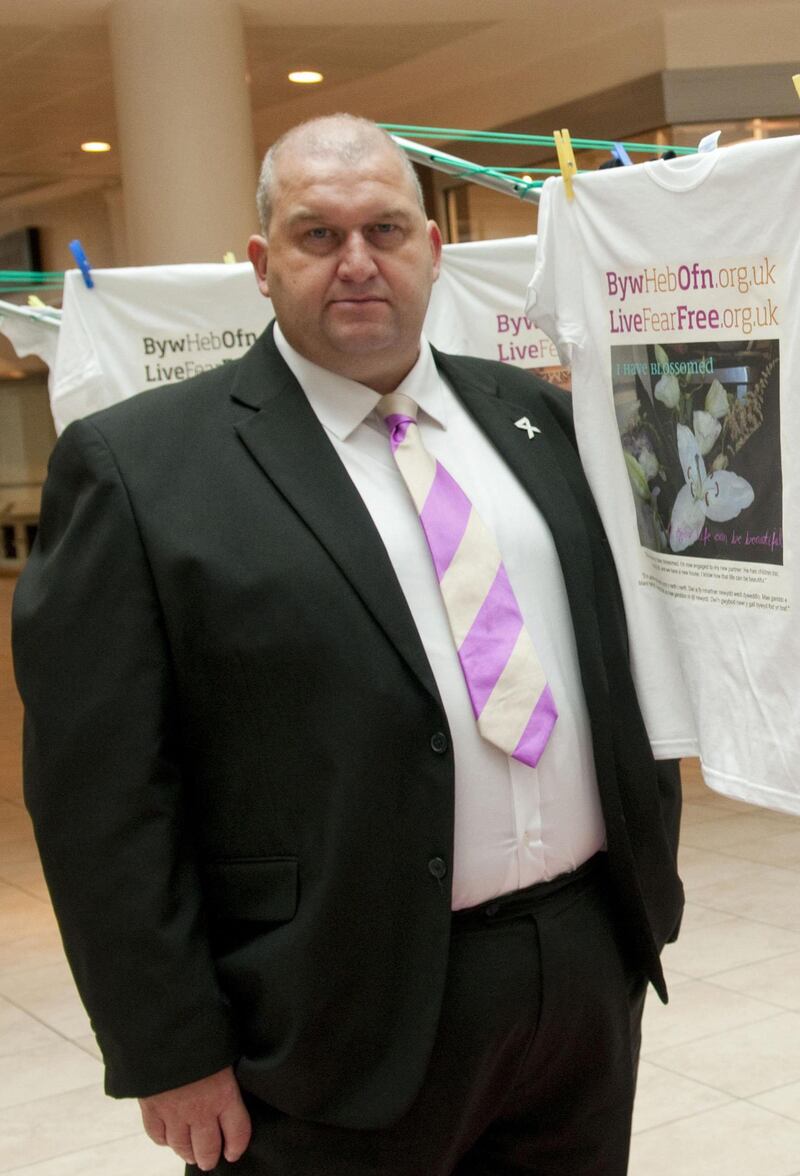 FILE - This is a Sept. 13, 2011 file photo of former Welsh government minister Carl Sargeant. Sargeant who resigned from his post in the Welsh government last week after allegations of misconduct has died. The family of Sargeant said Tuesday Nov. 7, 2017 said that they were "devastated beyond words" by his death. (Benjamin Wright/PA, File via AP)