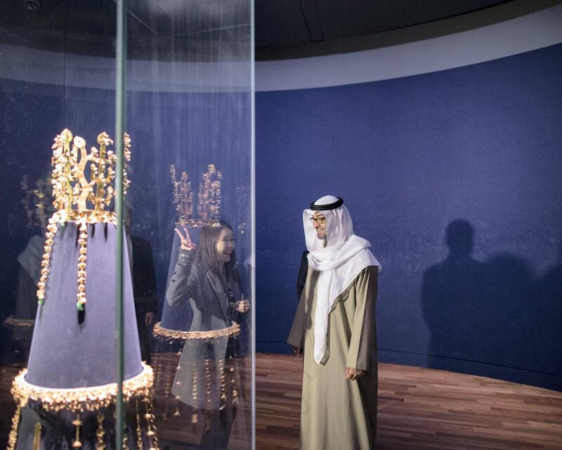 SEOUL, REPUBLIC OF KOREA (SOUTH KOREA) - February 27, 2014: HH General Sheikh Mohamed bin Zayed Al Nahyan Crown Prince of Abu Dhabi Deputy Supreme Commander of the UAE Armed Forces (R), looks at an artifact while visiting the National Museum of Korea. 
( Ryan Carter / Crown Prince Court - Abu Dhabi )
---