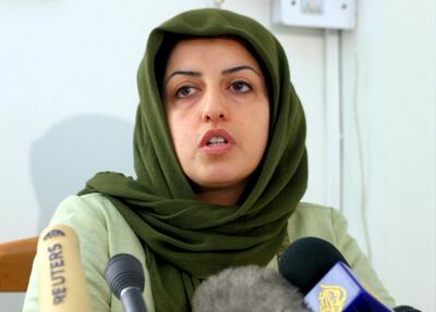 Narges Mohammadi, pictured at a conference in Tehran in 2005, is serving multiple sentences at the city's notorious Evin Prison. EPA 