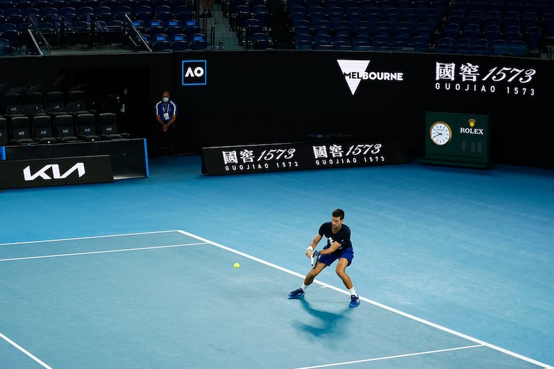 Novak Djokovic plays a backhand during a practice session ahead of the 2022 Australian Open at Melbourne Park. Getty Images