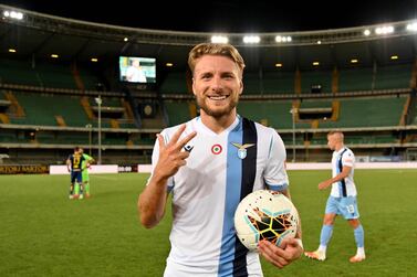 Ciro Immobile of SS Lazio at the end of the game with the ball after he scored three goals against Hellas Verona. Getty