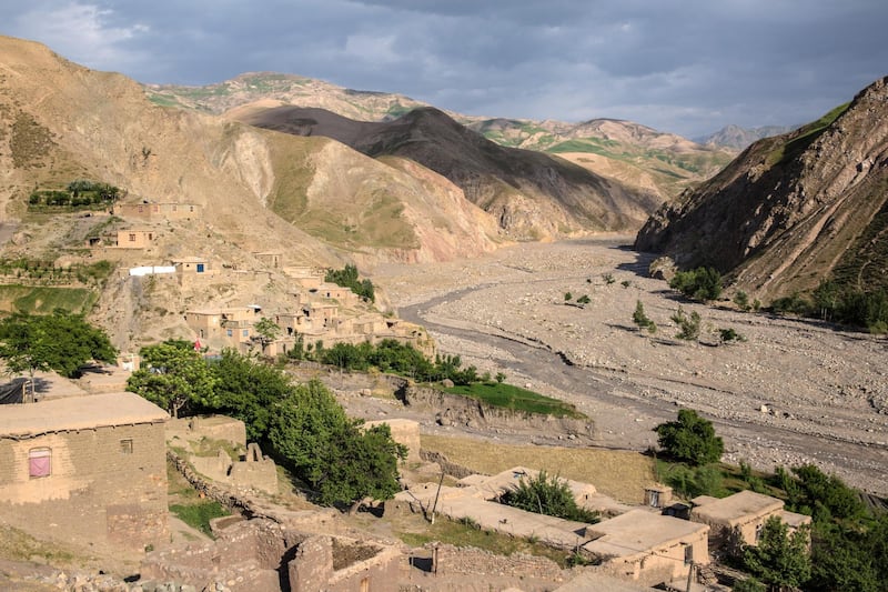 Arashakh Poen village in Afghanistan's Takhar province is cut off from the main road both by mountains and a river. 