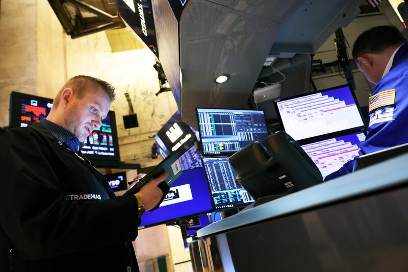 Traders at the New York Stock Exchange. Analysts expect the price cap on Russian refined product exports to have a bigger impact on global crude flows than the price cap on its crude. Getty