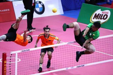 Southeast Asian Games - Sepak Takraw - Laos v Myanmar - Subic Gymnasium, Olongapo, Philippines - December 4, 2019 Laos' Souvannalith Noum in action with Myanmar's Tun Aung Pyae REUTERS/Athit Perawongmetha