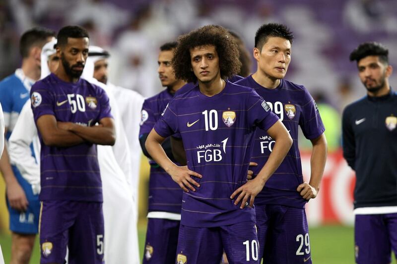 Omar Abdulrahman and his Al Ain teammates following defeat to Jeonbuk Hyundai Motors in the 2016 Asian Champions League final. AFP