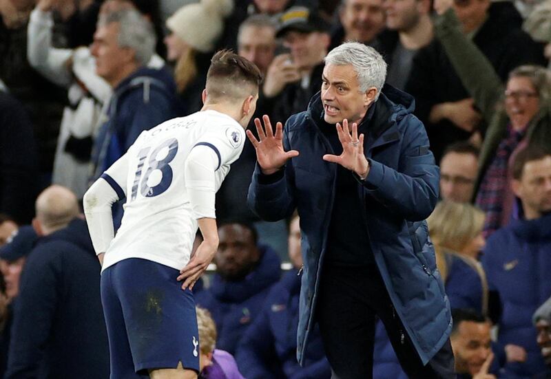 Giovani Lo Celso speaks with manager Jose Mourinho. Action Images via Reuters