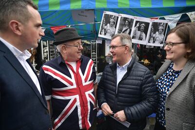 DUP leader Jeffrey Donaldson (second from right) on the campaign trail. Getty